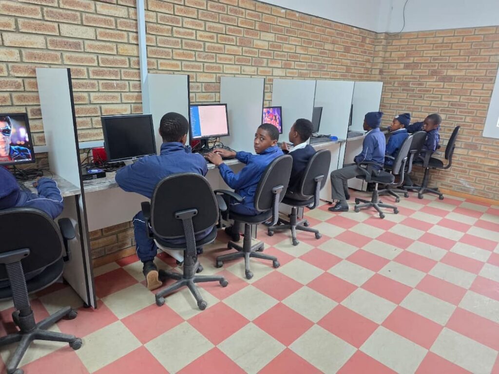 St Thomas learners using the school computers
